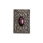Matchbox with a decorative stone