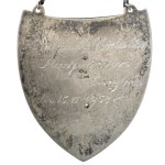 Silver gorget with an inscription, 1958