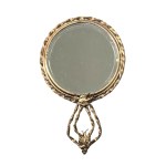 Hand mirror with a swallow