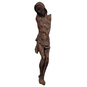 A wooden statue of Christ on the cross