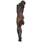 A wooden statue of Christ on the cross