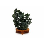 Dark green jade sculpture depicting birds and flowers, China,