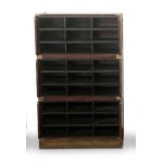 Three-section modular filing cabinet in the Campaign style with twenty-seven wooden and brass compartments