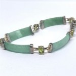 Silver bracelet with natural jade and peridots