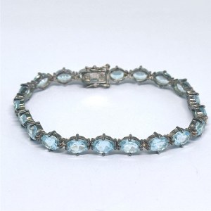 Silver bracelet with natural topaz stones