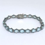 Silver bracelet with natural topaz stones