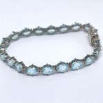 Silver bracelet with natural topaz stones