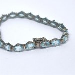 Silver bracelet with natural topaz stones