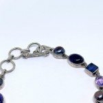 Silver bracelet with natural amethysts, iolites, and pearls