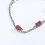 Silver bracelet with natural rubies and white sapphires