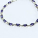 Silver bracelet with purple stones