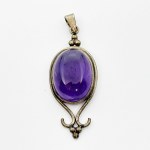 Silver pendant with a large amethyst cabochon