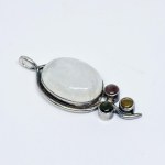 Silver pendant with a large moonstone, ruby, tourmaline, and citrine