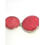 Silver pendant with a red coral bead