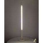 A tall floor lamp made of metal, in an industrial style. It most likely comes from the Netherlands.
