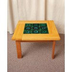 A square coffee table made of solid oak, with a tabletop decorated with ceramic tiles. Edmund Jorgensen, Denmark, 1970s/1980s.
