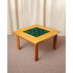 A square coffee table made of solid oak, with a tabletop decorated with ceramic tiles. Edmund Jorgensen, Denmark, 1970s/1980s.