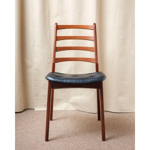 A beautiful chair made of teak wood, with a vinyl-covered seat. Germany, 1970s.