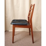 A beautiful chair made of teak wood, with a vinyl-covered seat. Germany, 1970s.