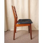A beautiful chair made of teak wood, with a vinyl-covered seat. Germany, 1970s.