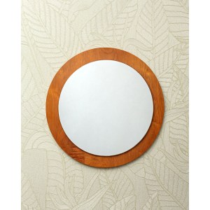 A large round wall mirror in a teak frame, from Denmark. 1970s/1980s.