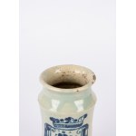 Antique ceramic jar, decorated with a floral coat of arms