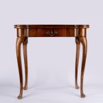 Eighteenth-century-style game table with a book-shaped top. 19th century.