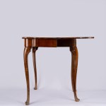 Eighteenth-century-style game table with a book-shaped top. 19th century.