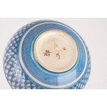Ceramic bowl with floral and geometric motifs in shades of light blue, by Mariane Johnson for Royal Copenhagen, circa 1960