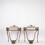 Pair of elegant nightstands with bronze frames and white marble tops, late 19th century