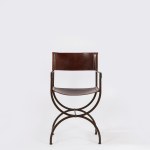 Curule chair made of wrought iron and leather