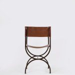 Curule chair made of wrought iron and leather