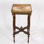 Carved wooden gueridon with gilded bronze elements, late 19th century