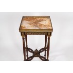 Carved wooden gueridon with gilded bronze elements, late 19th century