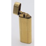 Lighters - CARTIER - Lighter - Gold-plated body. In fair condition...