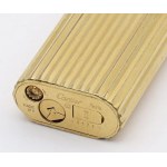 Lighters - CARTIER - Lighter - Gold-plated body. In fair condition...
