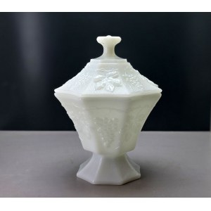 Large glass candy dish on a pedestal with a grapevine motif—1970s
