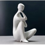 "Lost in Thought" porcelain figurine—designed by Jitka Forejtová—Royal Dux—1960s