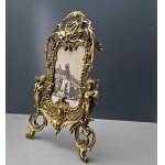 Ornate brass frame with cherubs—second half of the 20th century