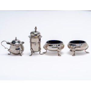 Two salt shakers, a pepper shaker, and a mustard jar, England, early 20th century