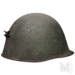 20th Century/Poland: Polish Helmet, Model 31 / Ludwików Steelworks, Kielce / Salamander / Shot through in September 1939 / Second Polish Republic