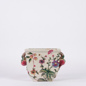 Polychrome porcelain flowerpot decorated with floral motifs