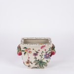 Polychrome porcelain flowerpot decorated with floral motifs