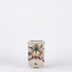 Polychrome porcelain flowerpot decorated with floral motifs
