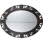 Oval mirror made of gilded and carved wood, in the style of