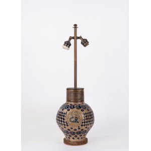 Antique majolica pitcher mounted on a lamp