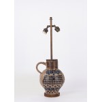 Antique majolica pitcher mounted on a lamp