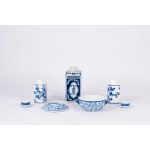 Lot consisting of three flasks and a bowl with a lid, made of white and blue porcelain