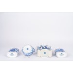 Lot consisting of three flasks and a bowl with a lid, made of white and blue porcelain