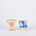 A majolica vase and jug